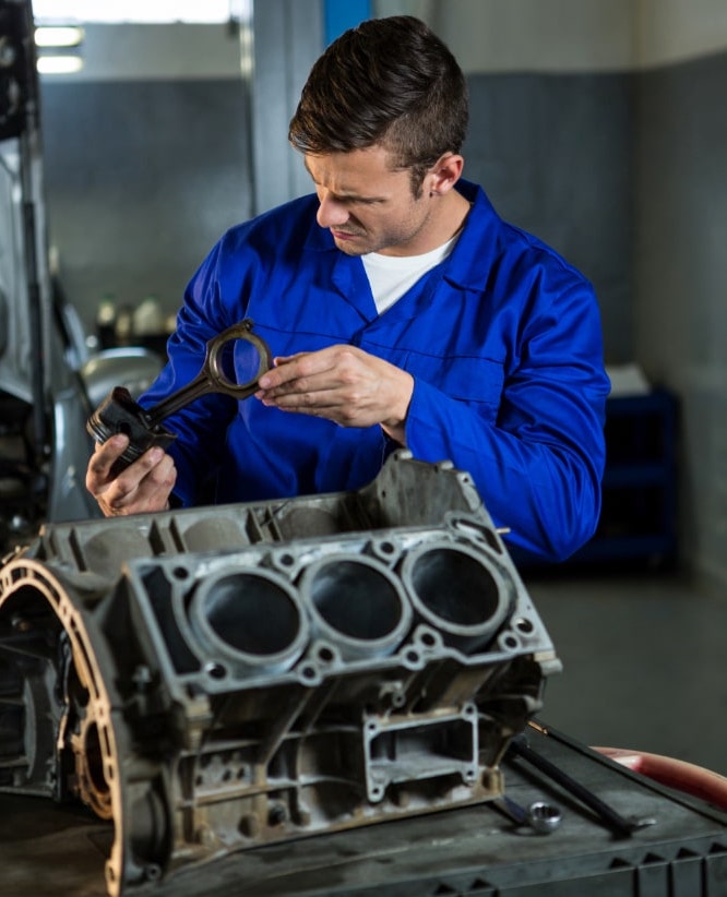 mechanic-working-engine-min